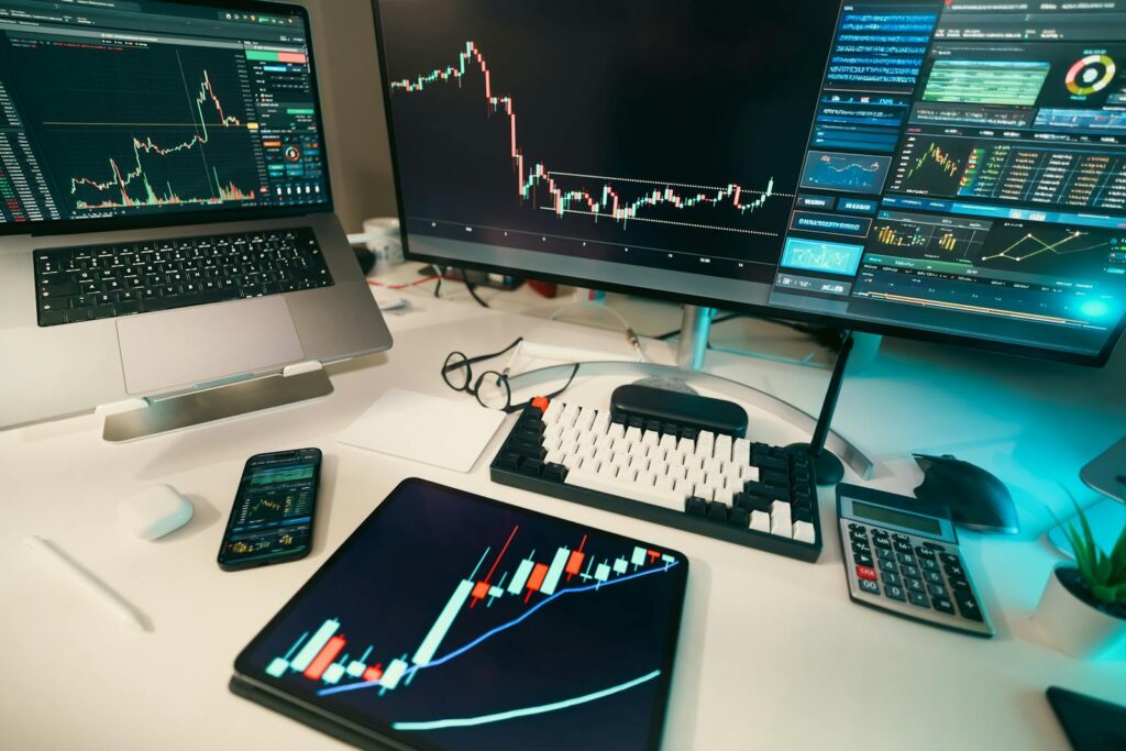 A laptop showing financial spreadsheets on a tidy desk